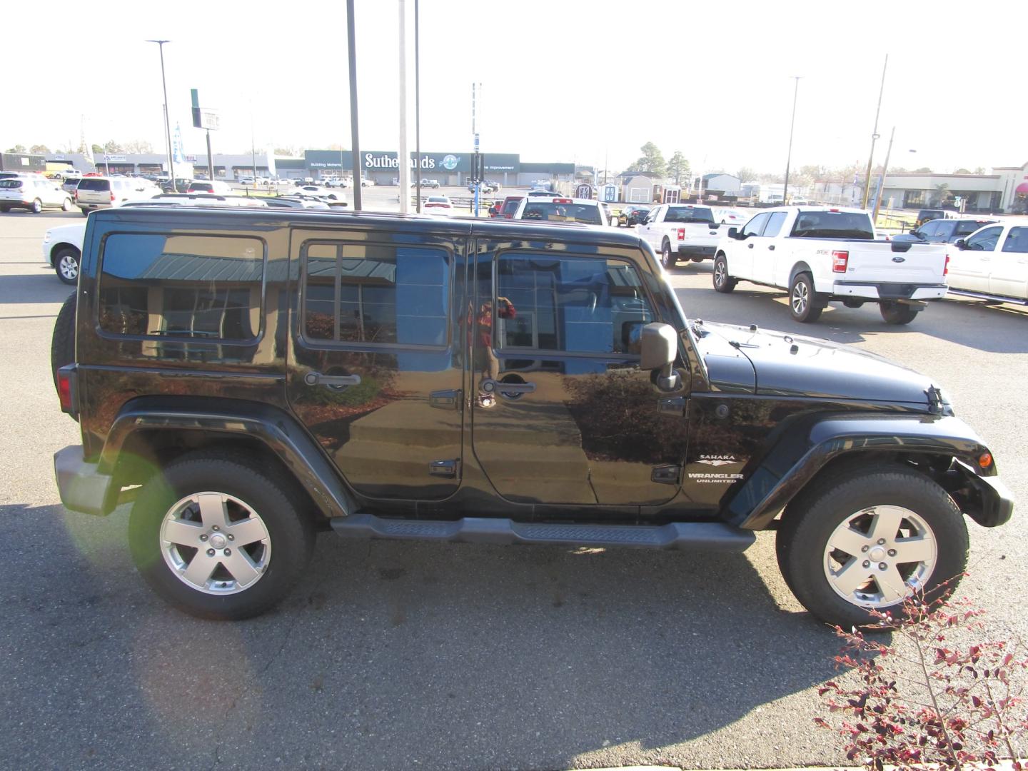 2012 BLACK /Gray / Cloth Jeep Wrangler WRANGLER UNLIMITED (1C4BJWEG8CL) with an 3.6L V6 engine, located at 1814 Albert Pike Road, Hot Springs, AR, 71913, (501) 623-1717, 34.494228, -93.094070 - ONE OWNER - Photo#2